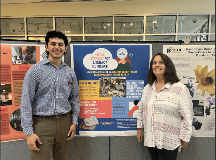 Gabriel Villamil stands next to Tara Truett 