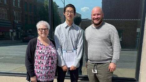 Max Wang' 22 with the City of Oneida Mayor Helen Acker and Director of Planning and Development Chris Henry