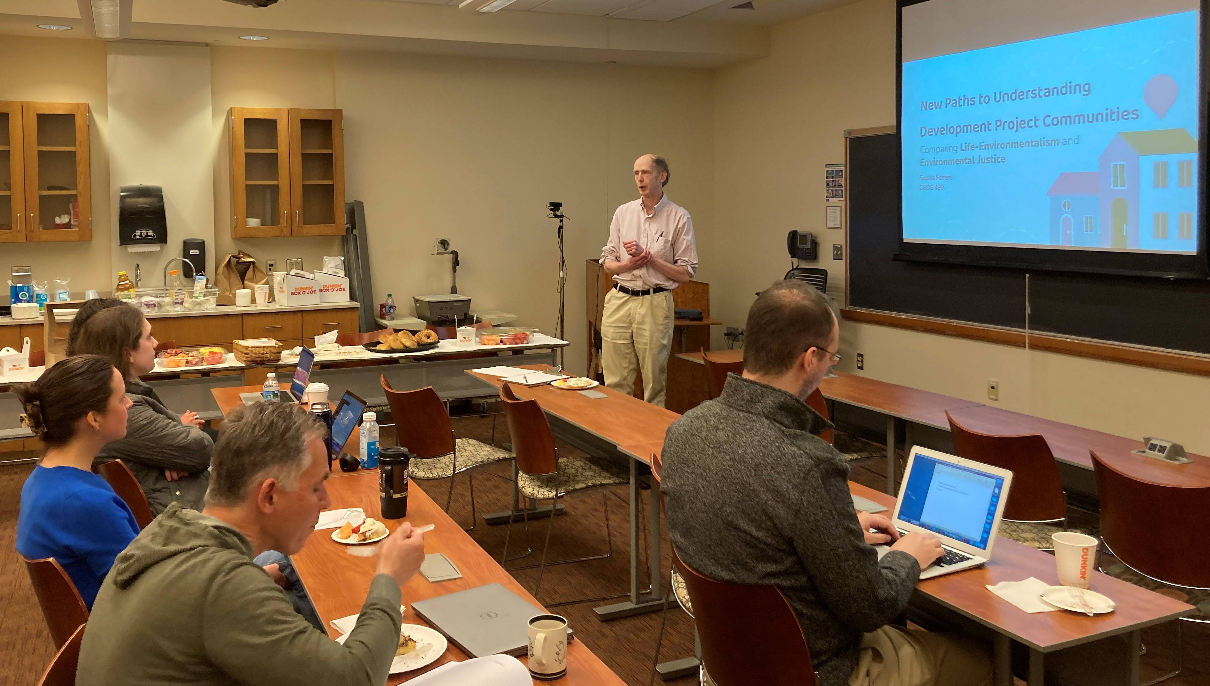 Professor William Meyer introducing senior honors thesis.