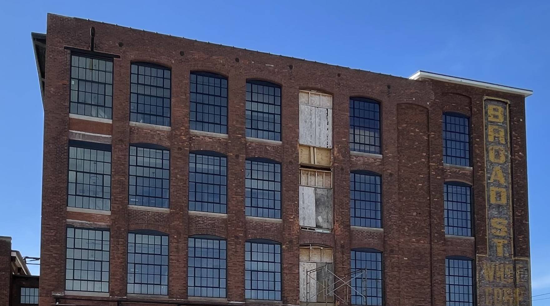 A still-under construction warehouse-style apartment building that will house a mixture of low-income families and youth who are transitioning out of homelessness, in Utica, NY.