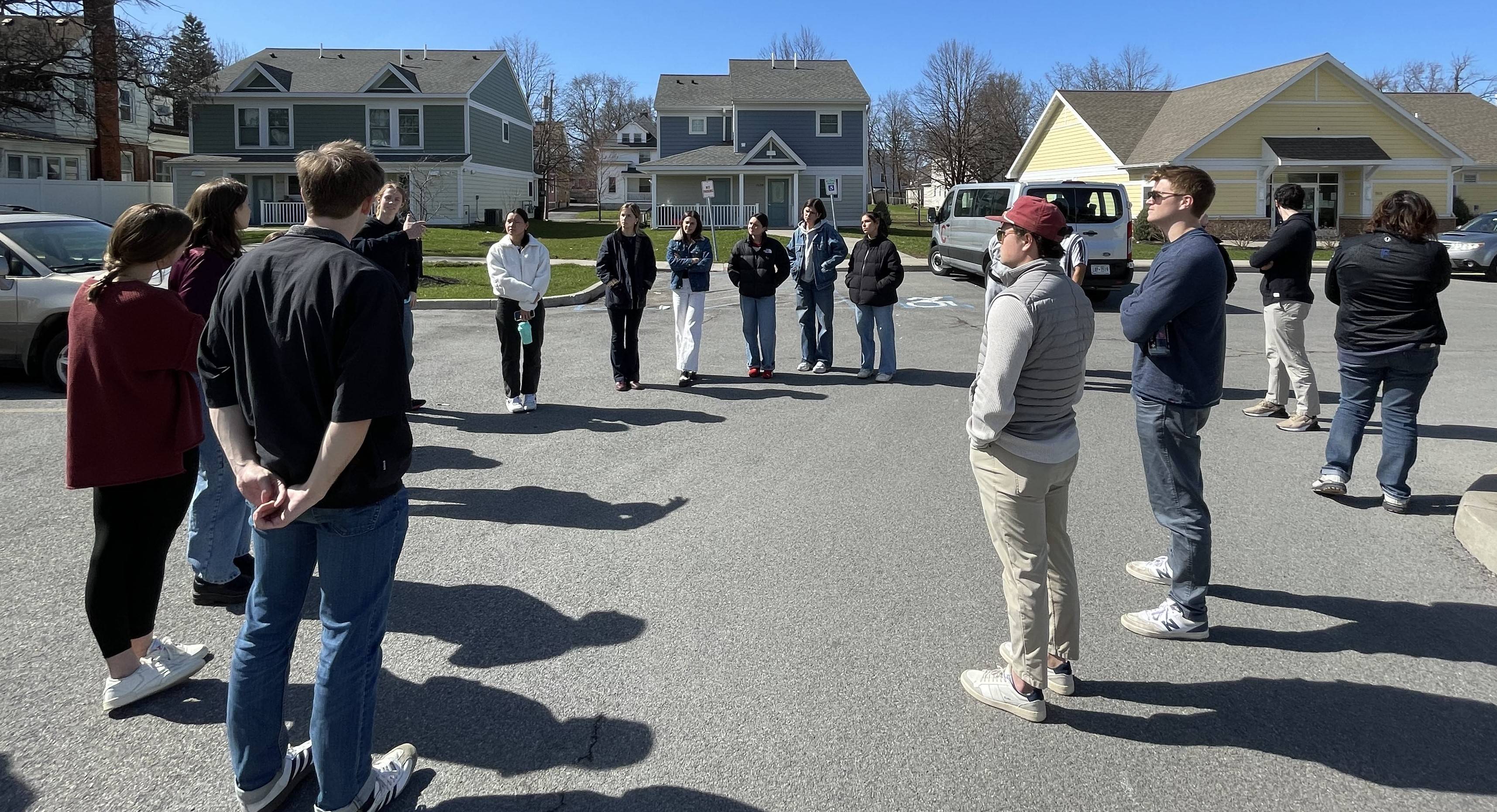 Students from Professor Hamlin's Geography 353/Sociology 353 course guided by the executive director and several staff members of People First, the public housing authority of Utica, New York.
