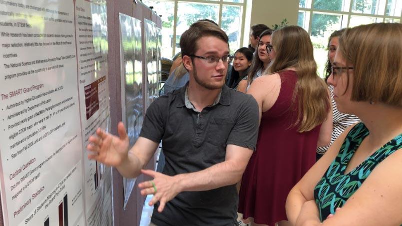 Jake Scott presents an academic poster