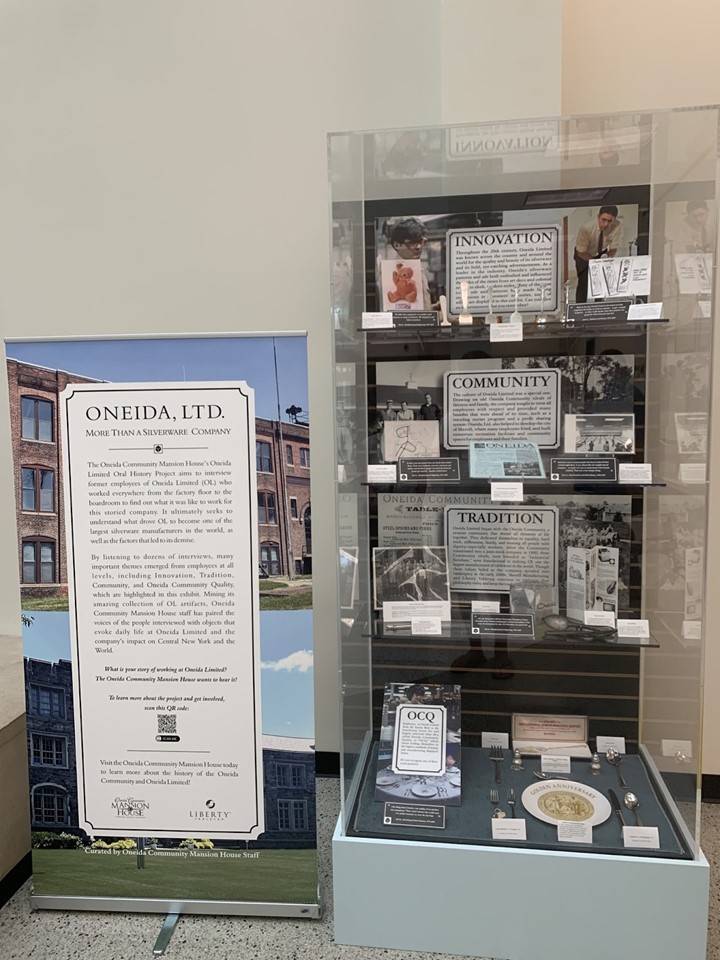 A photo of the finished installation of Oneida Limited, oral history exhibit, entitled "Oneida, Ltd.: More than a Silverware Company" at the Madison County Courthouse.