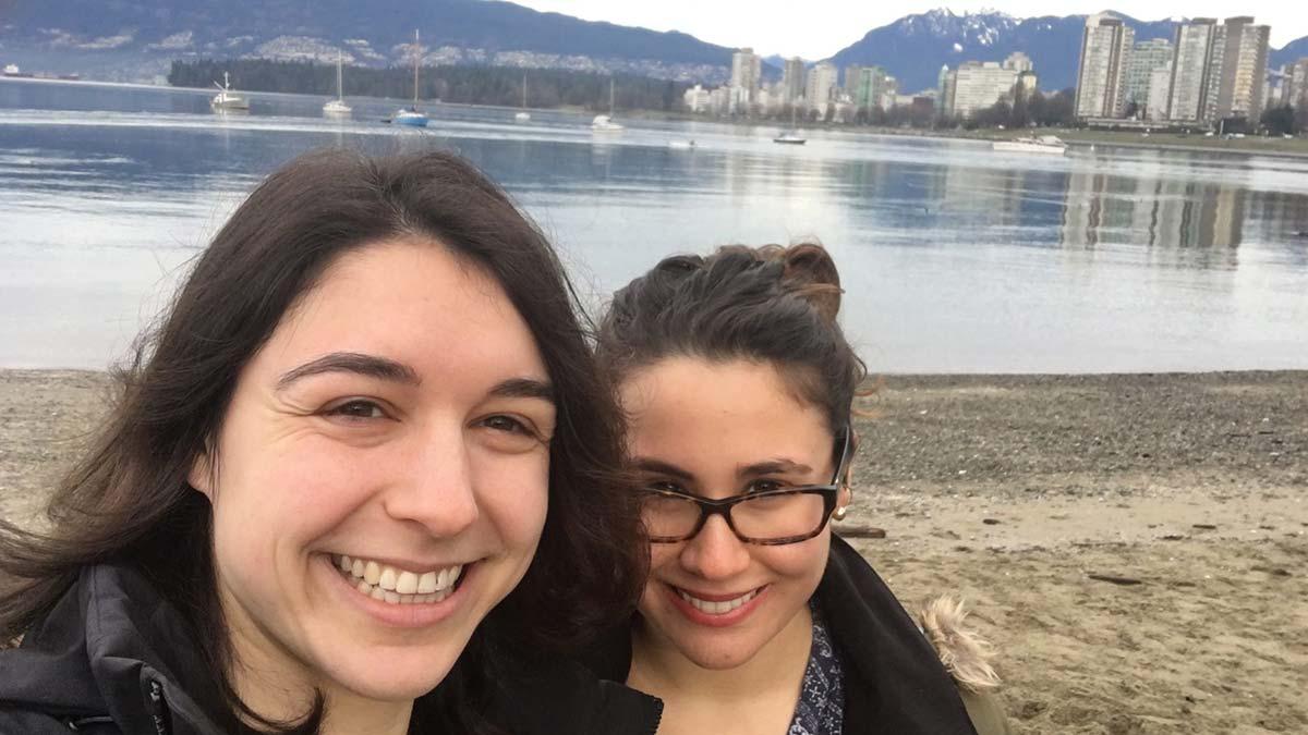 Rachel Weinstein ’18 and Geli Greco ’18 on the shore of a lake