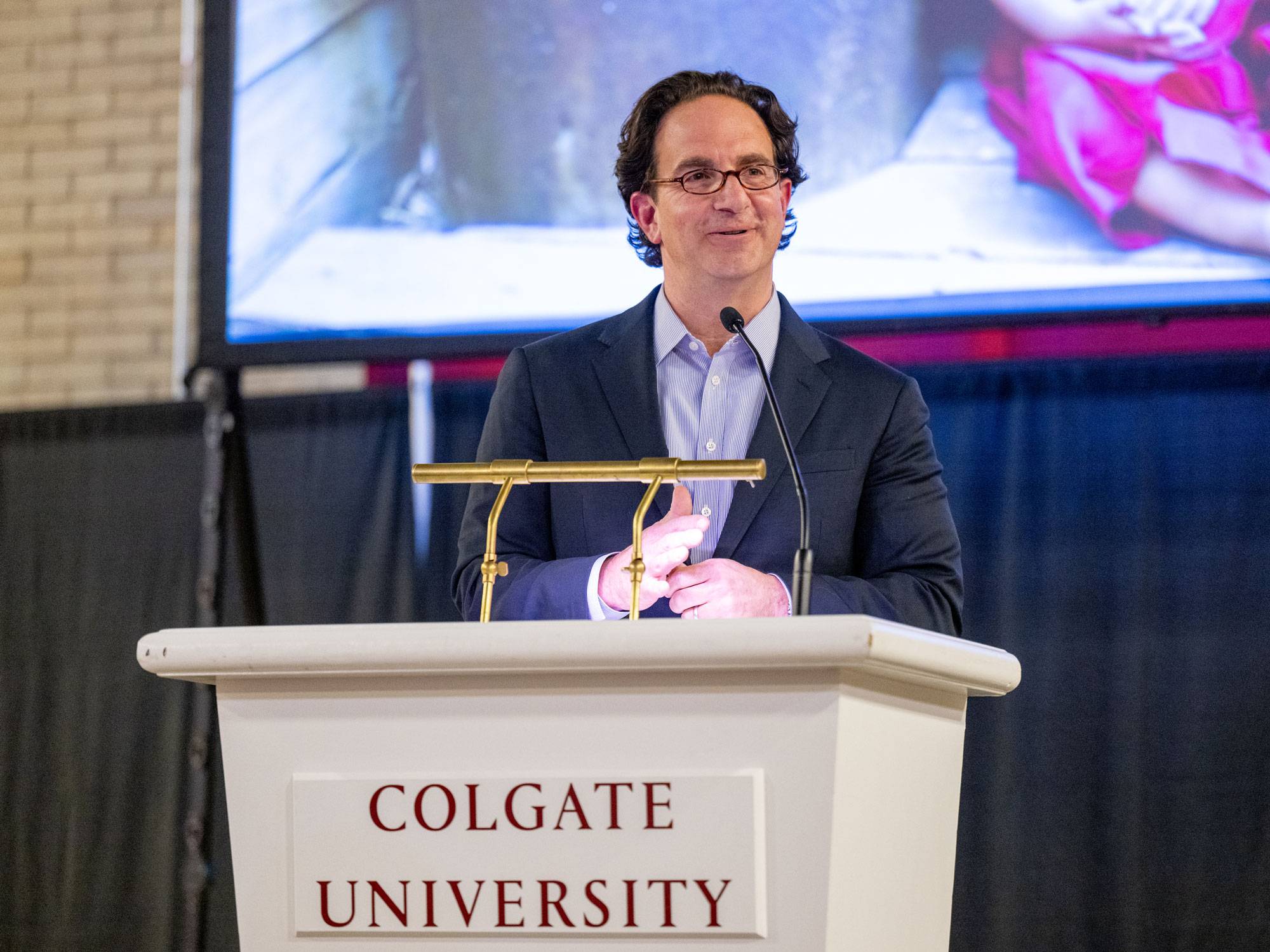 Toby Bozzuto at podium