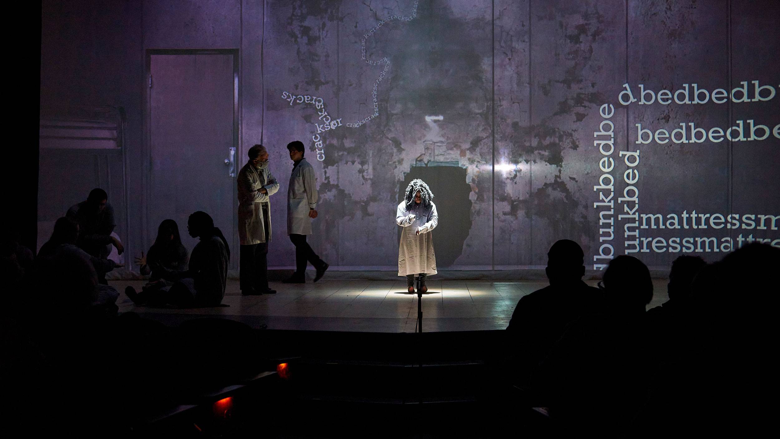 Actor stands on stage