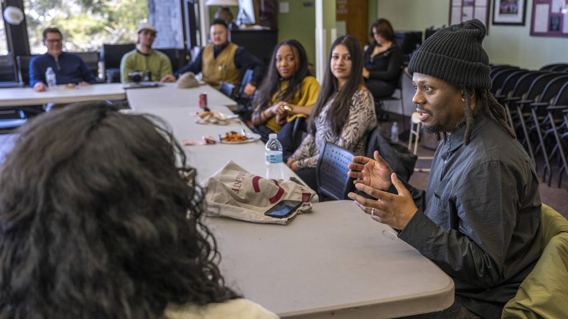 Bobby Carter speaks with students