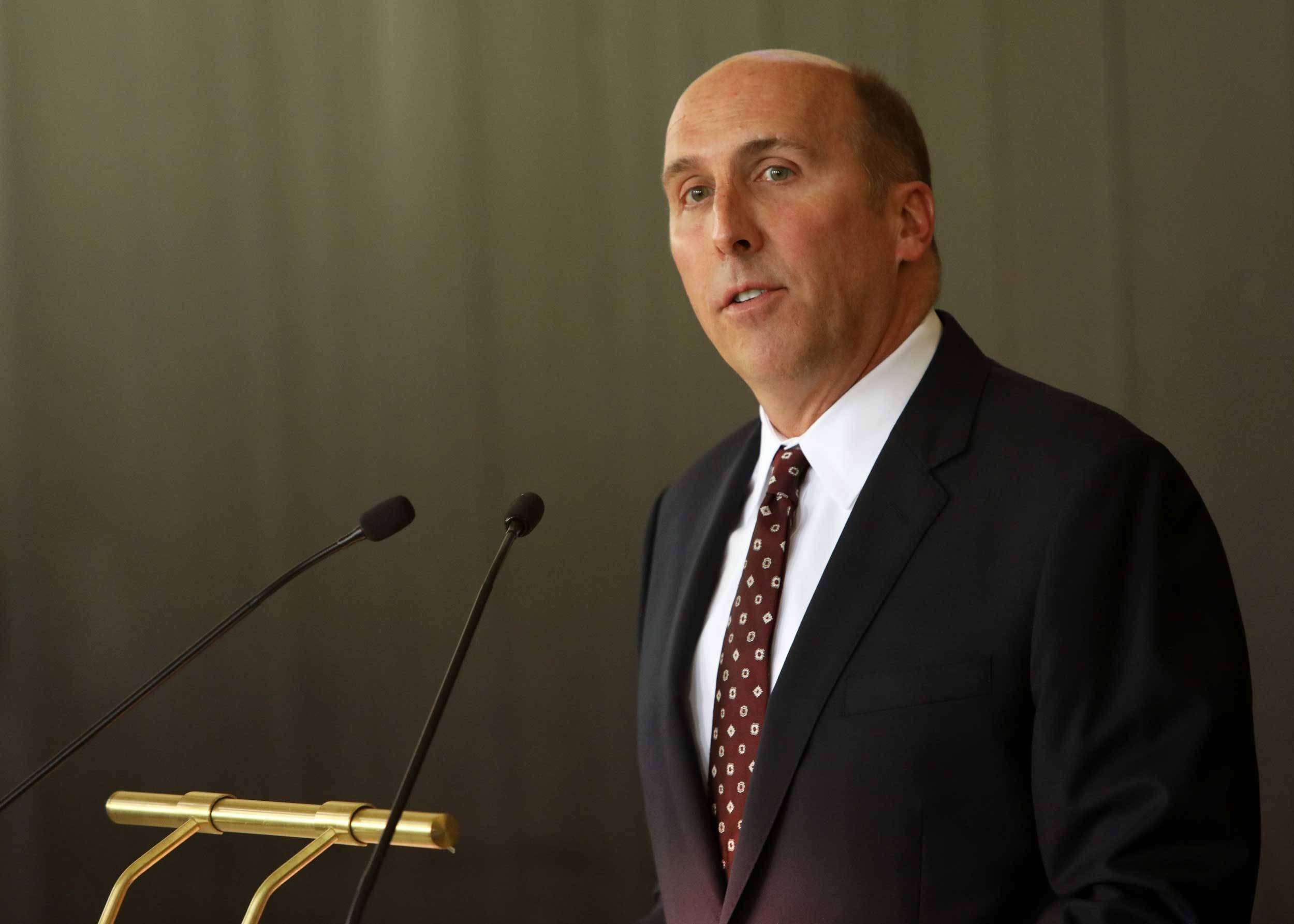President Brian W. Casey at lectern 
