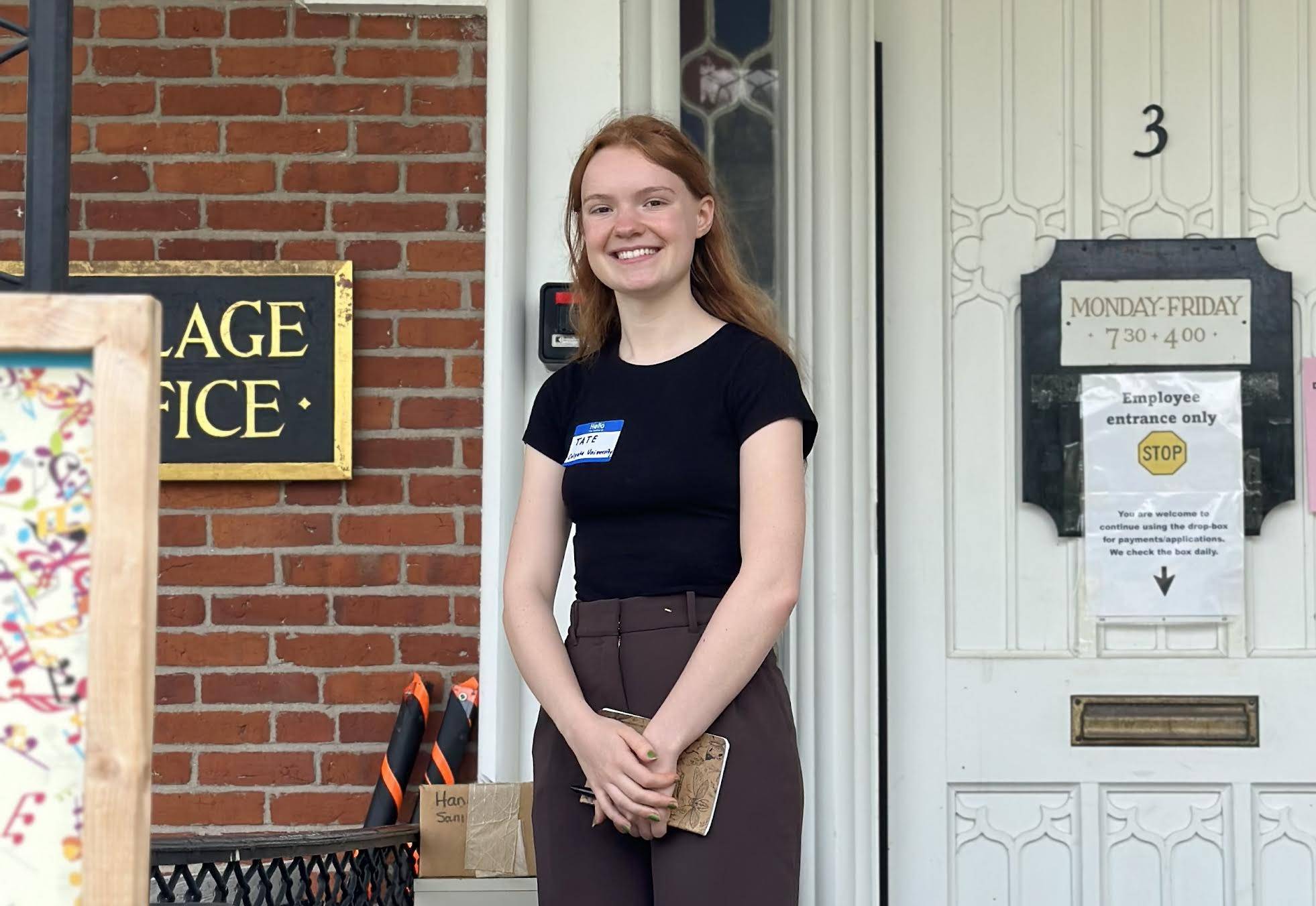 Tate Fonda in front of village office