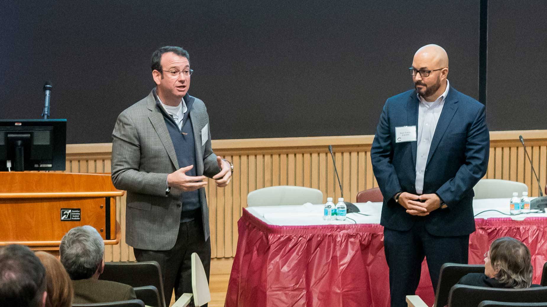 Jon Sendach ’98 and Sean Fadale address members of the Colgate community. (Photo by Mark DiOrio)