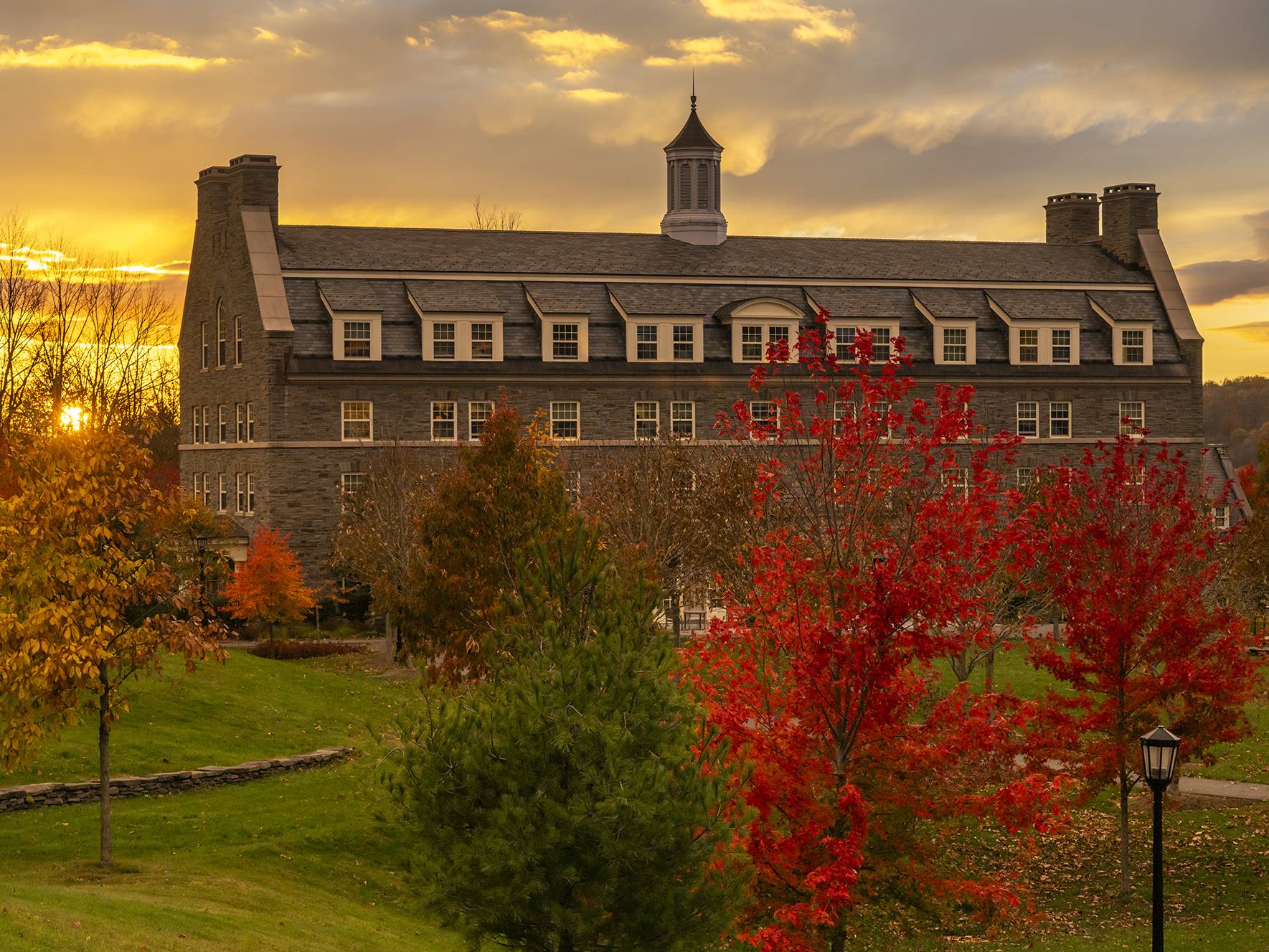 The sun sets behind Jane Pinchin Hall