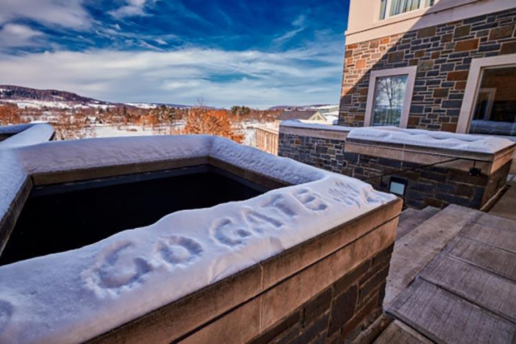 "Go 'Gate" written in snow.