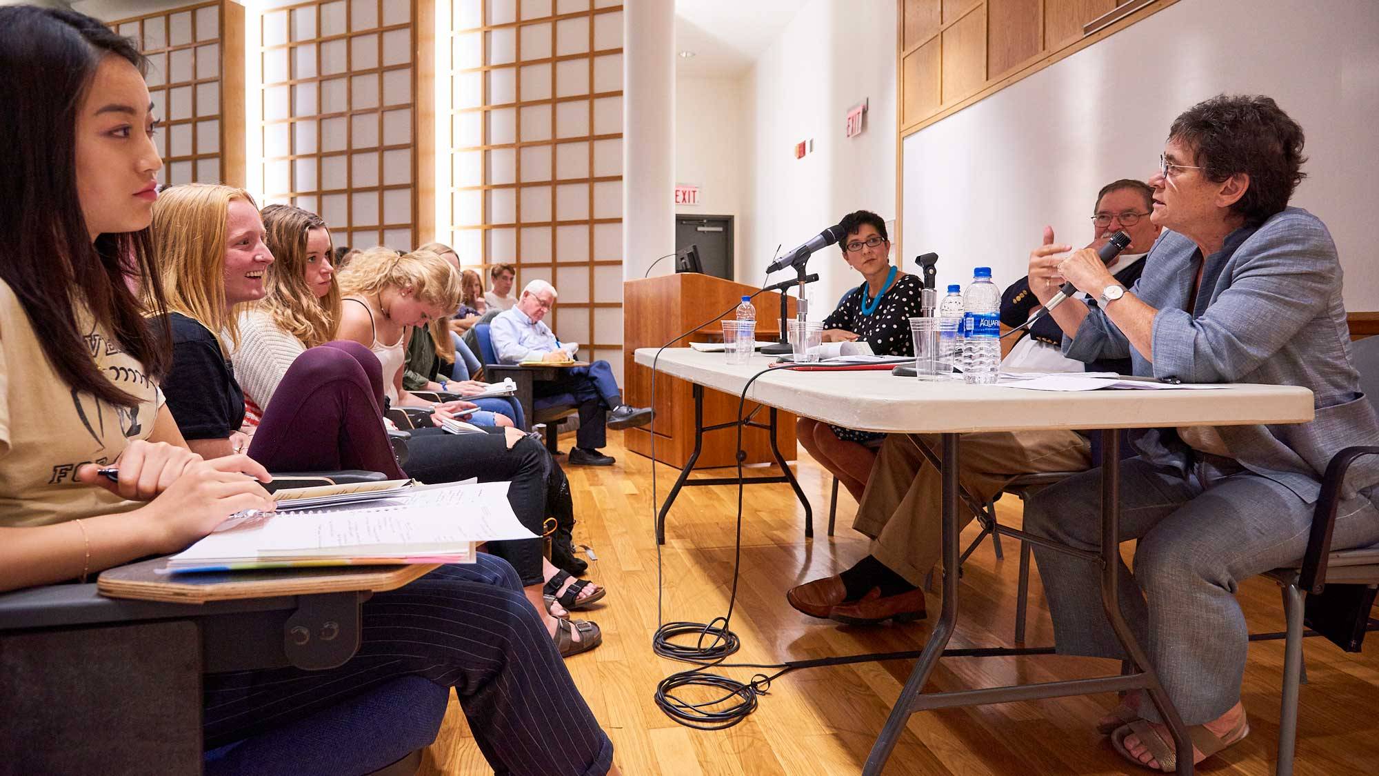 Kathryn Kolbert (foreground right) and Melissa Moschella (center) debate Roe v. Wade on Constitution Day