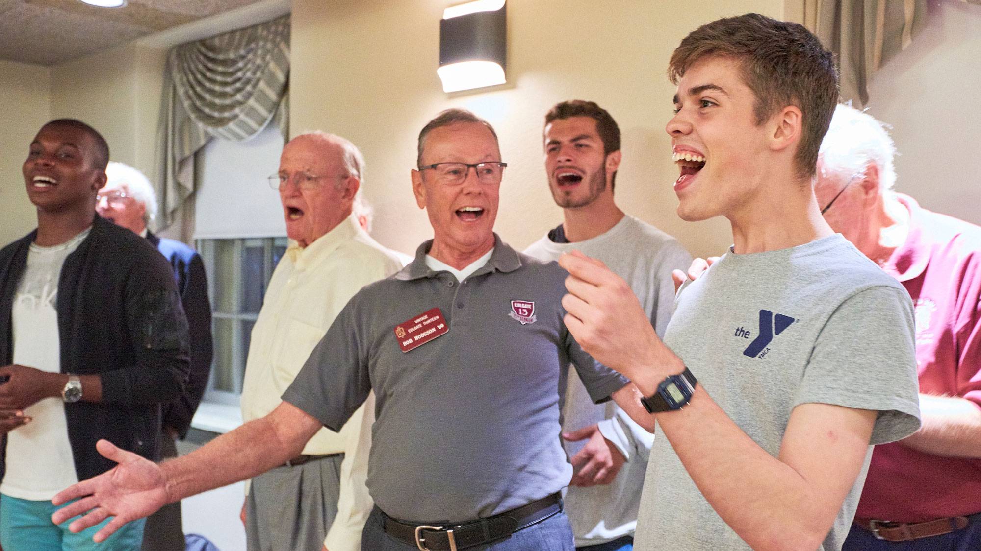 Members of Colgate Thirteen sing