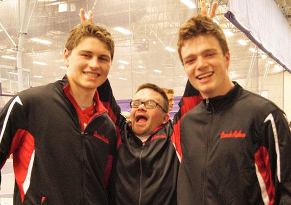 Aidan Gaertner ’20 and others pose for a photo at the Special Olympics of Minnesota