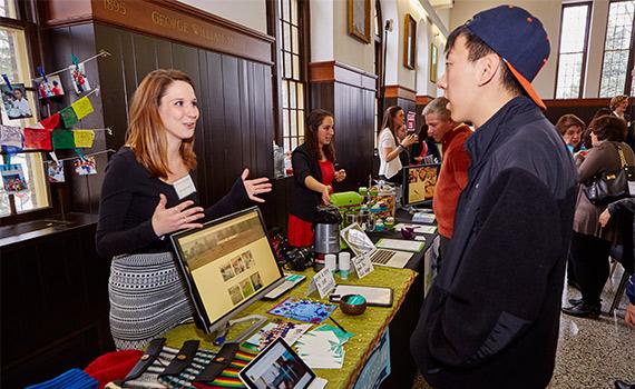 Amanda Brown ’15 talks to a student at eWeekend.