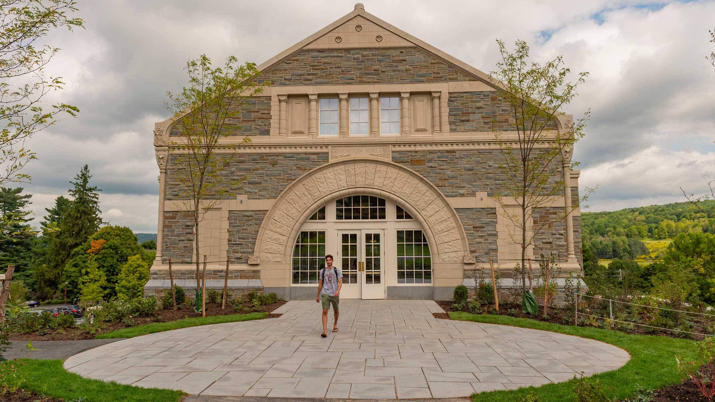 Student walks out of Benton Hall