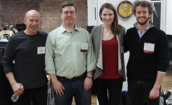 (Left to right) Thought Into Action founder Andy Greenfield ’74, P’12, digital technology network volunteer Jeff O'Connell ’94, Amanda Brown ’15, and Thought Into Action Executive Director Wills Hapworth ’07 during Colgate's Hackathon on Saturday, March 14