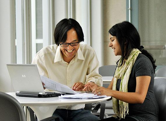 Professor Takao Kato and a student conduct research