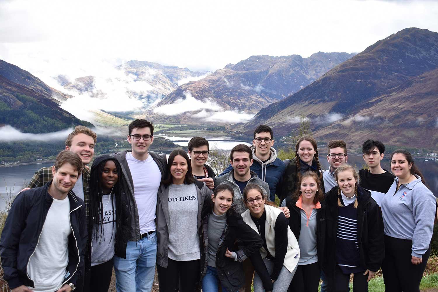 Prof. Jacob Klein (left) with members of the spring 2018 St. Andrews Study Group in front of lake in Scotland