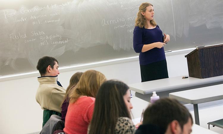 Assistant Professor of Political Science Danielle Lupton teaching a class in 2014.
