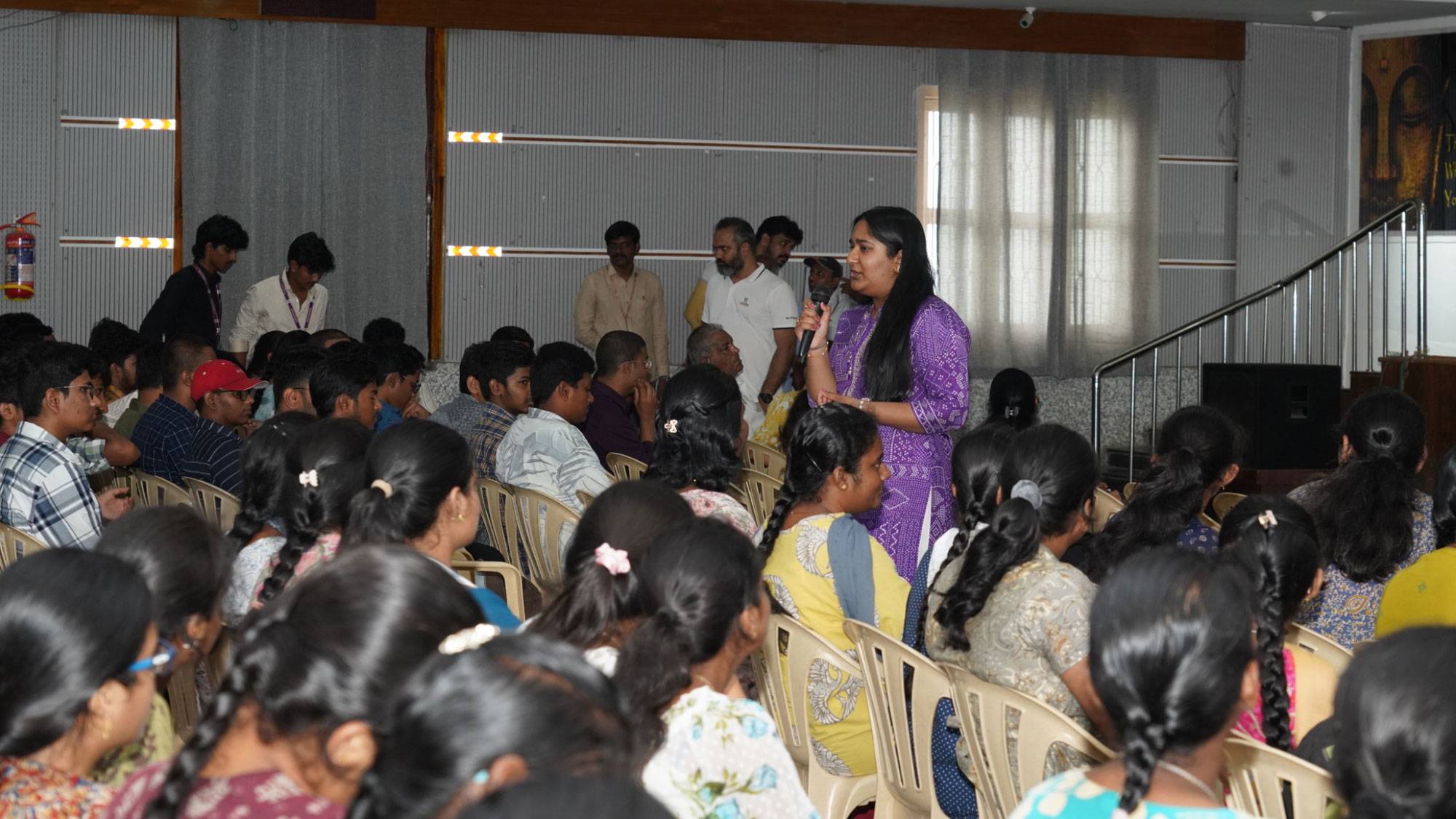 Harshitha Talasila leads a workshop on mental health and drug abuse at Velagapudi Ramakrishna Siddhartha Engineering College in Vijayawada, India.