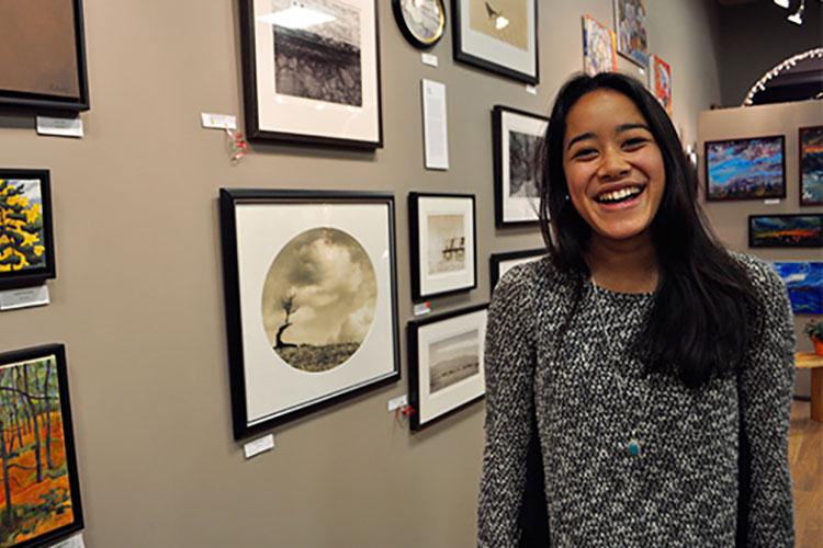 Colgate student Ranissa Adityavarman '16 smiles in a photo at an art gallery.