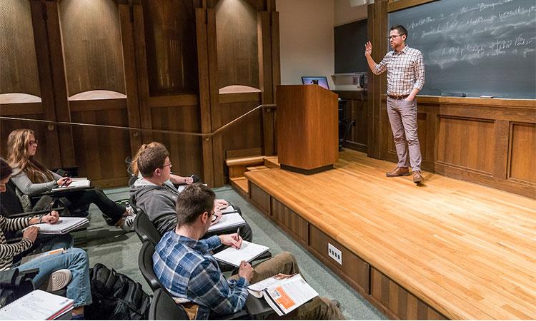 Sam Rosenfeld, assistant professor of political science, teaches a political science course in Lawrence Hall, March 26, 2018.