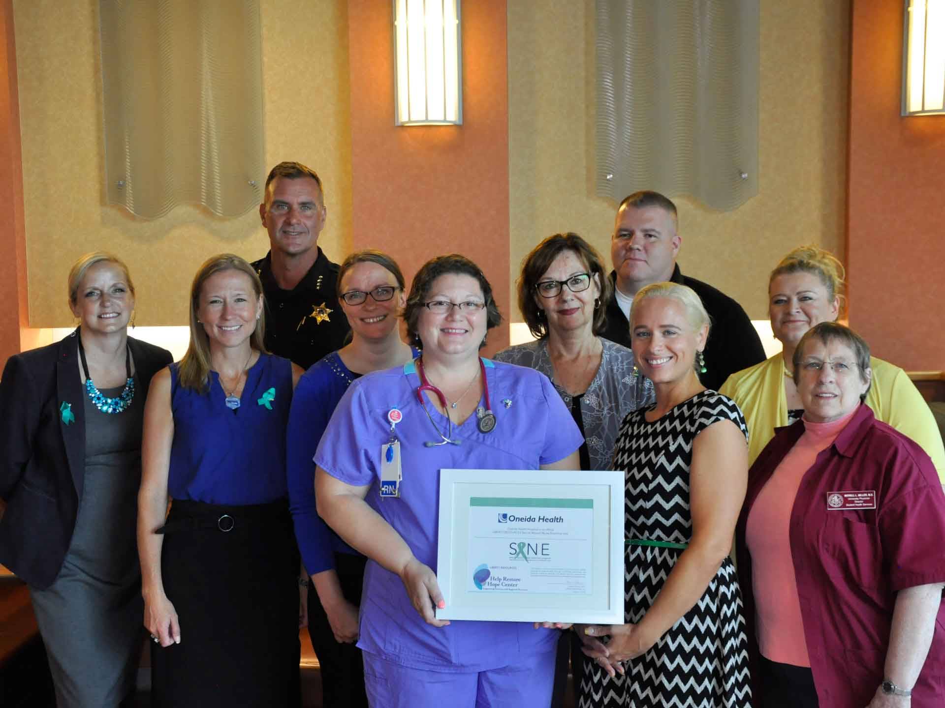 Group photo of Partners in Madison County’s Sexual Assault Nurse Examiner (SANE) program at a press conference on August 6, 2019 at Oneida Healthcare 