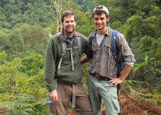 Eddie Watkins and Wes Testo ’12 in the field