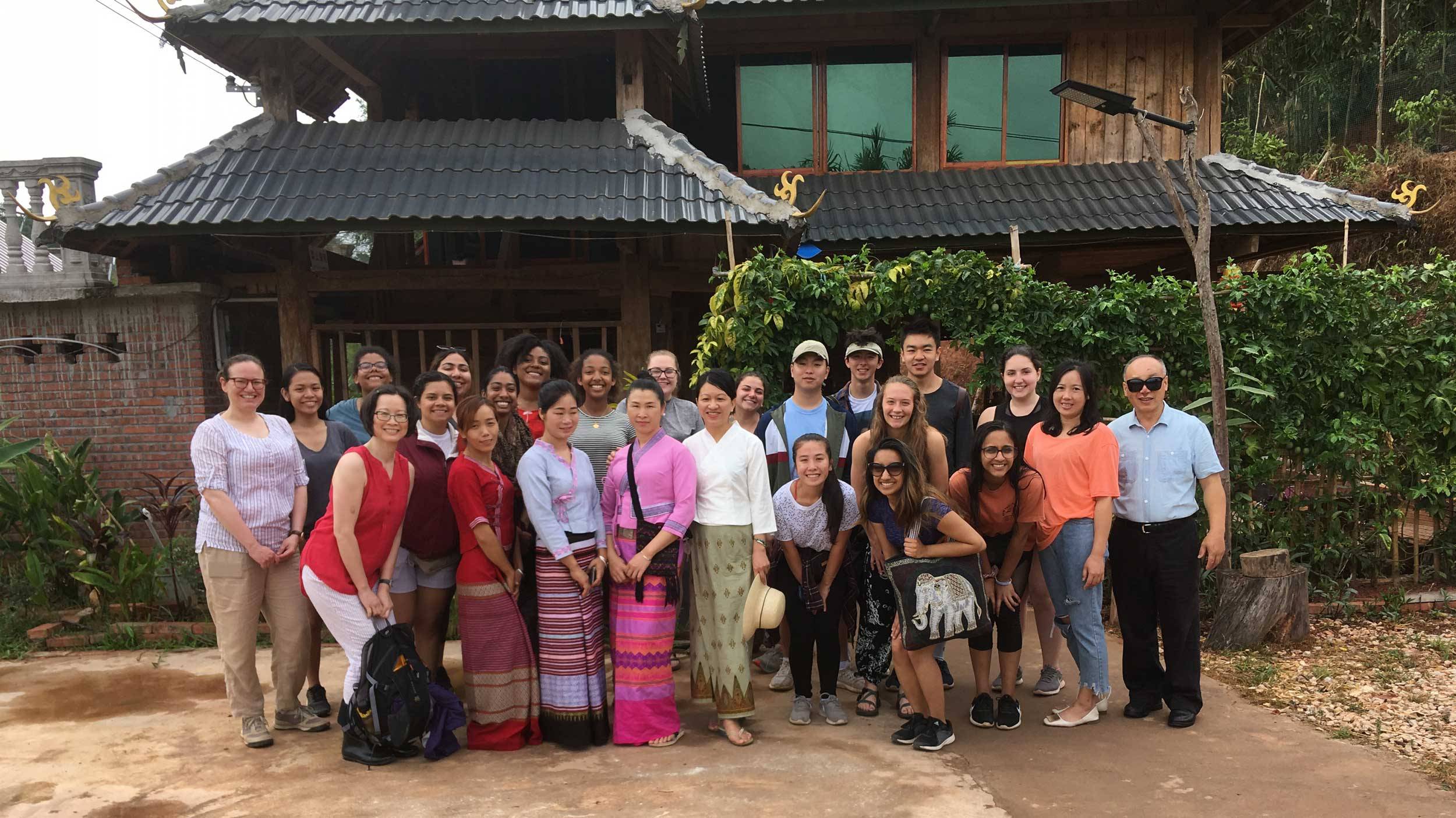 Students, faculty, and friends pose for portrait while traversing Yunnan Province