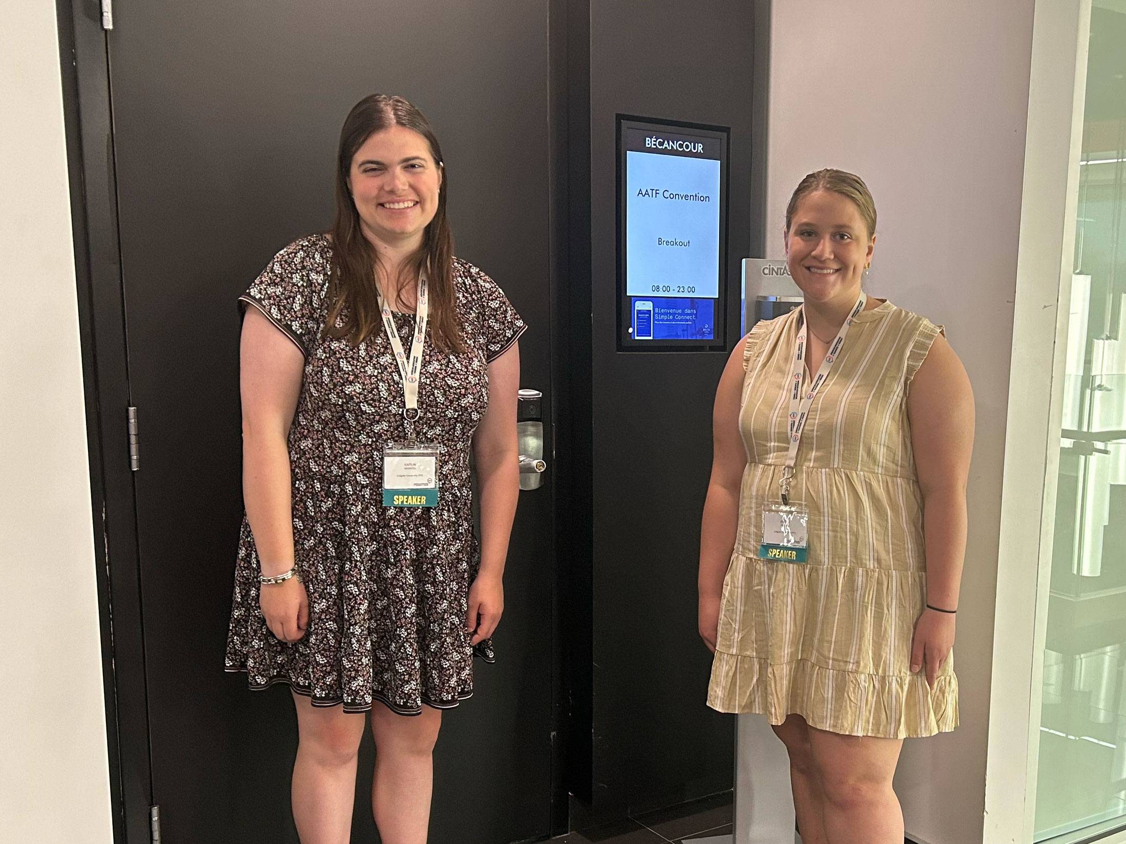 Kaitlin Maratea ’25 and Amelia Rastley ’25 in front of conference venue