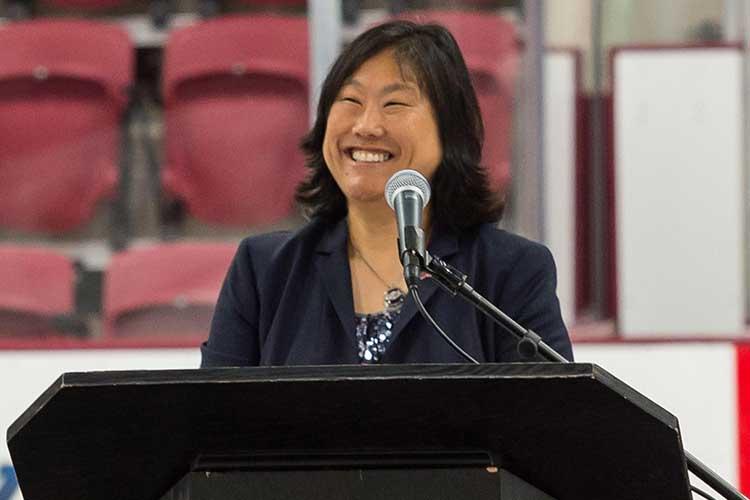 Vicky Chun ’91, MA’94 stands at podium