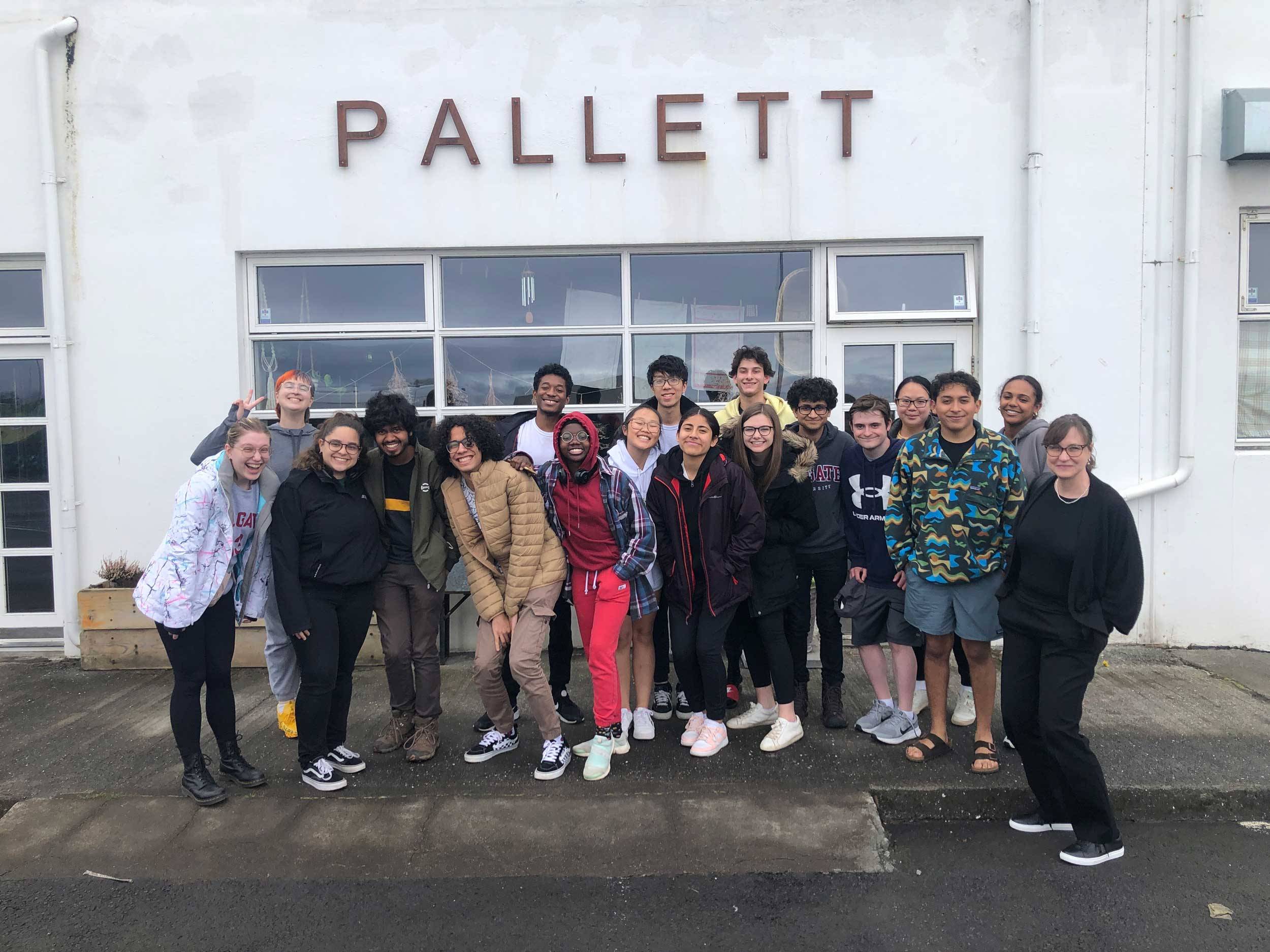 Group photo of SRS students and faculty outside coffee shop