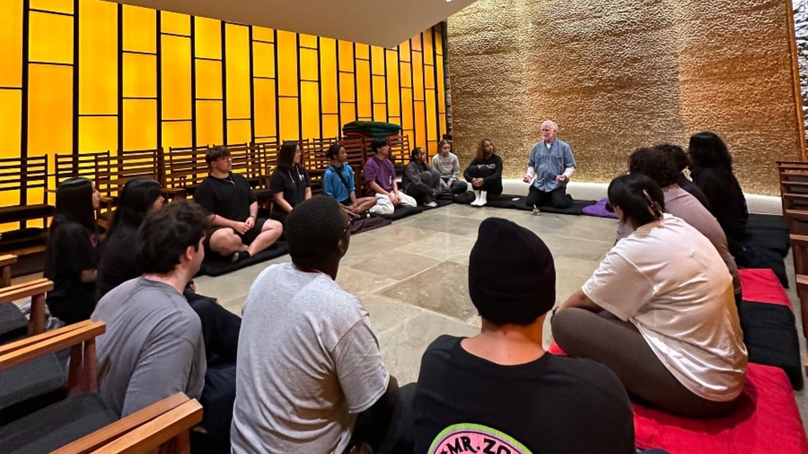 Colgate community members gathered at Chapel House for a meditation session