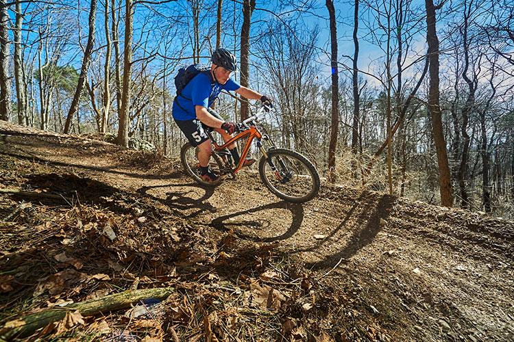 A person riding their bike on the trails