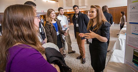 Students share information about their internships during a Summer Expo session.