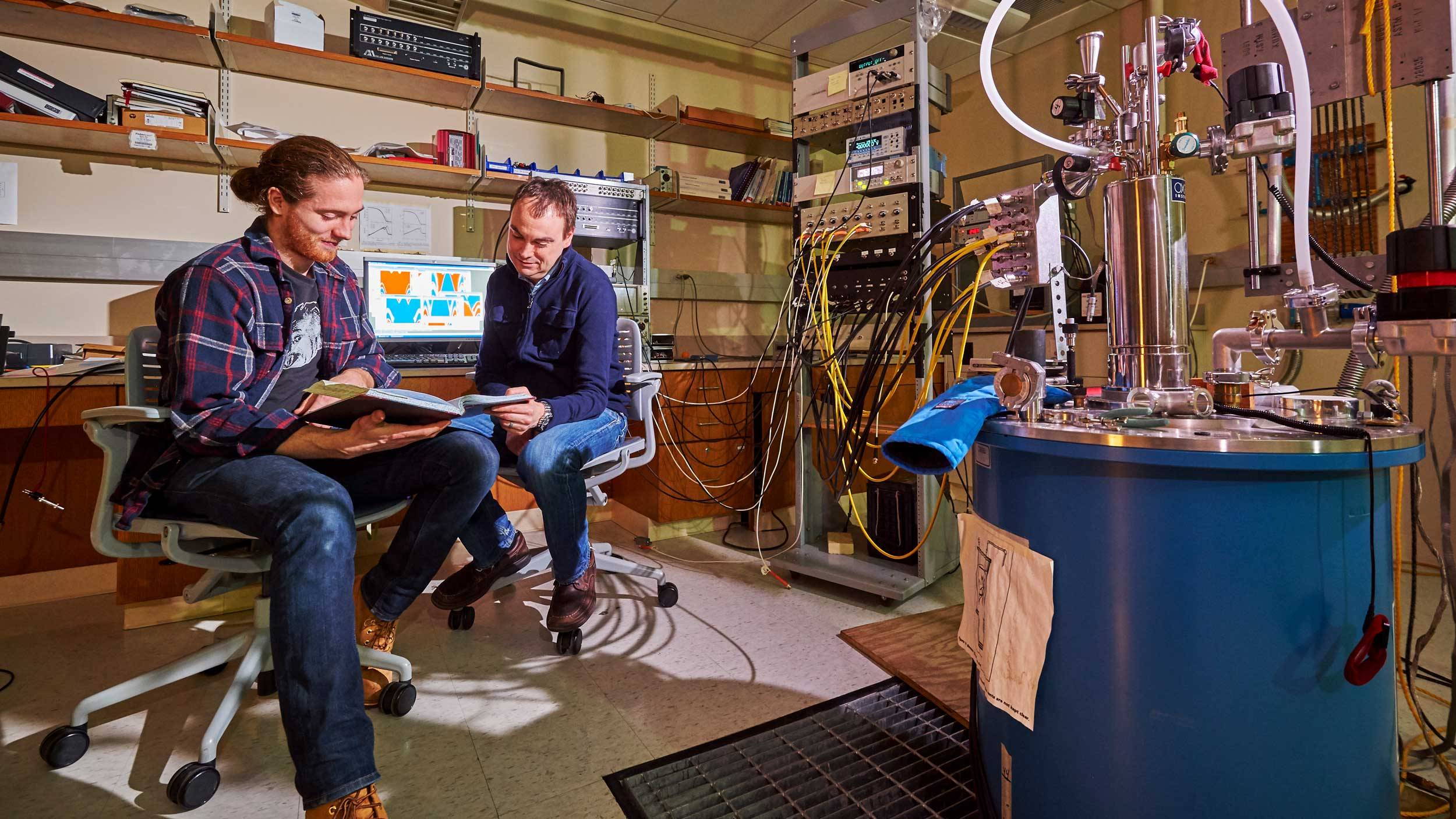 Prof. Ken Segall with student in his lab