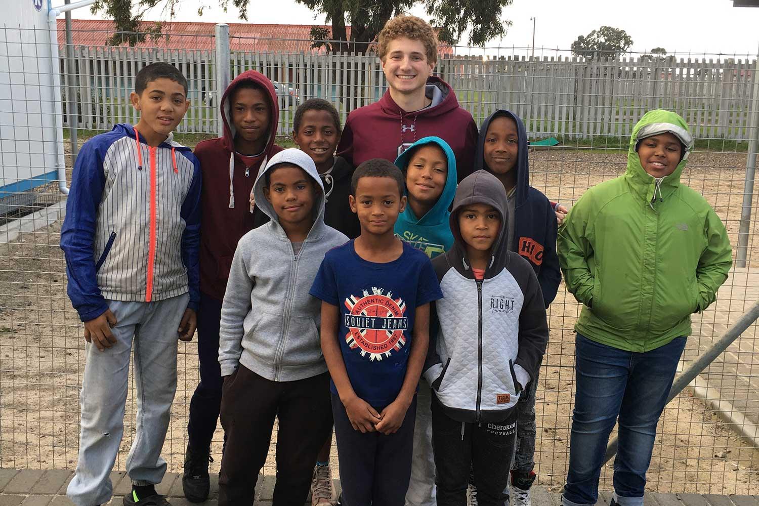 Brady Pearlstein '21 with students in South Africa