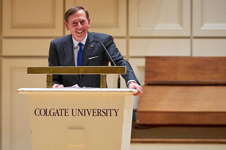 Retired general David Petraeus stands at Colgate University podium delivering a speech during Family Weekend 2017