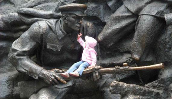 Soldier and Child, Soldier and Child at the Museum of the Great Patriotic War, Kiev. (Photo by André Simonyi)