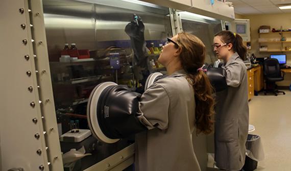 Melissa Barnard '15 and Tia Cervarich '16 work in the lab of Professor Anthony Chianese.