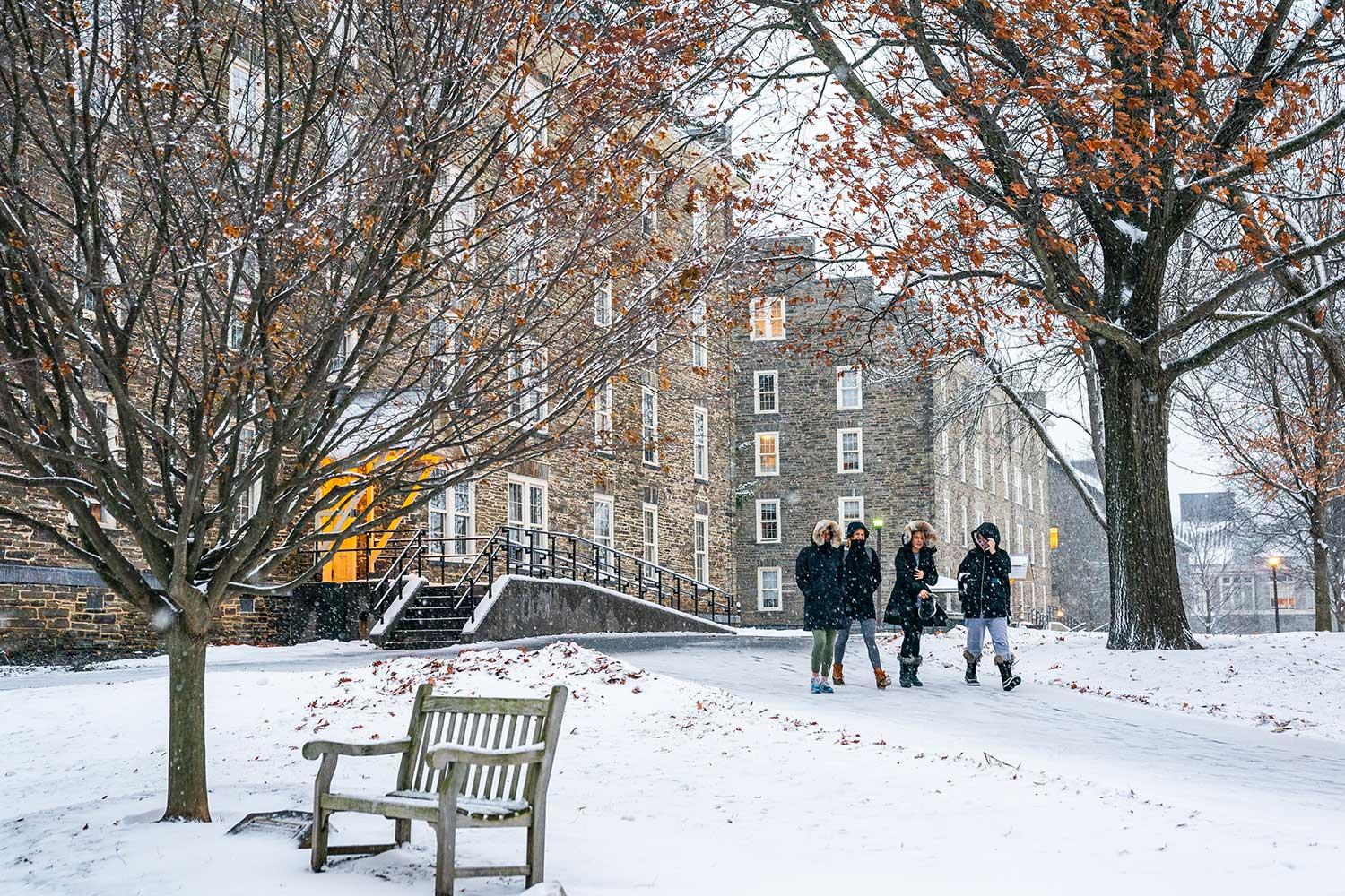 Students walking on the quad in the winter